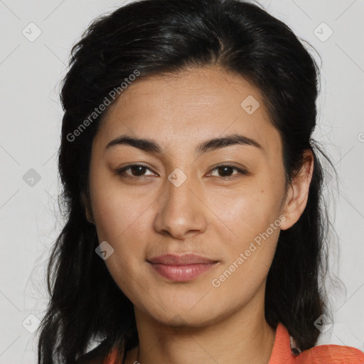 Joyful latino young-adult female with long  brown hair and brown eyes