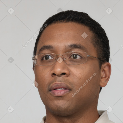 Neutral black young-adult male with short  black hair and brown eyes