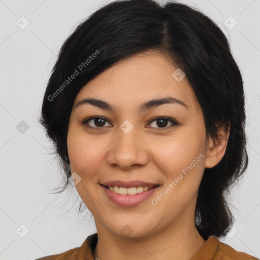 Joyful latino young-adult female with medium  black hair and brown eyes