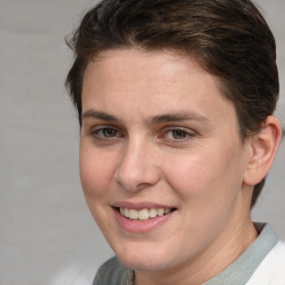 Joyful white adult female with short  brown hair and brown eyes