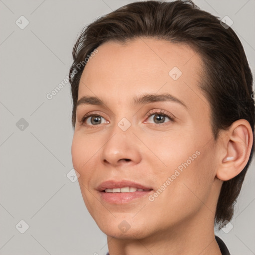 Joyful white young-adult female with medium  brown hair and brown eyes