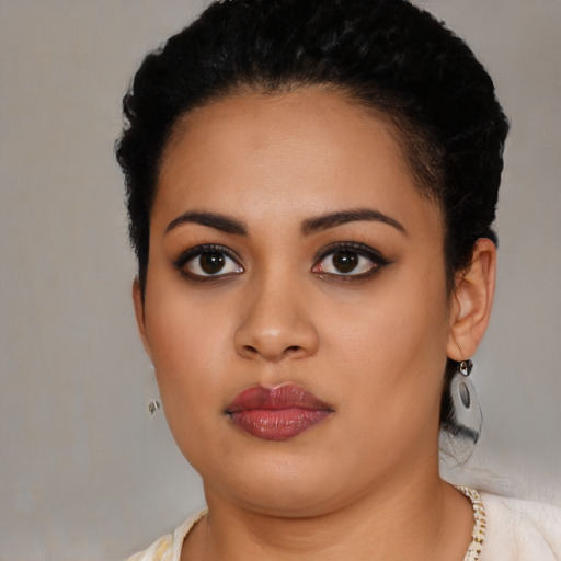 Neutral latino young-adult female with short  black hair and brown eyes