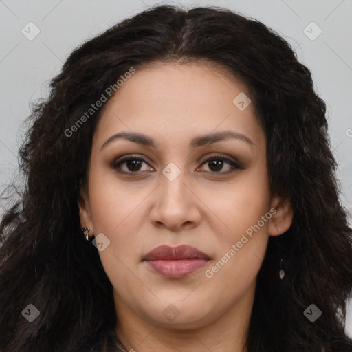 Joyful latino young-adult female with long  brown hair and brown eyes