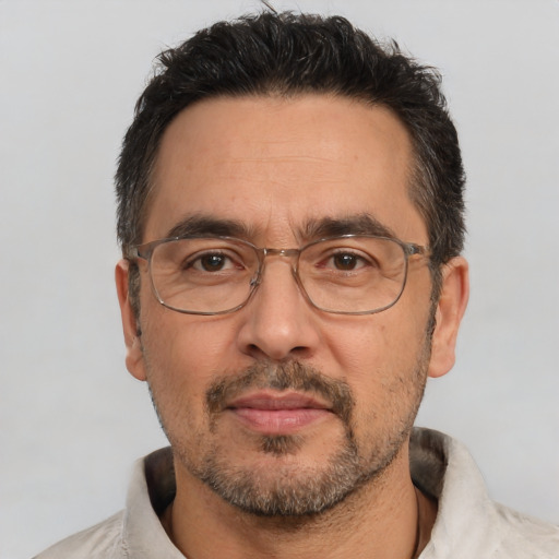 Neutral white adult male with short  black hair and brown eyes