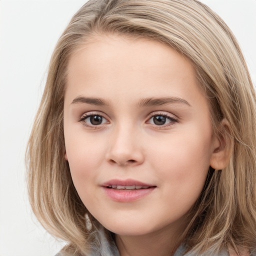 Joyful white child female with long  brown hair and brown eyes