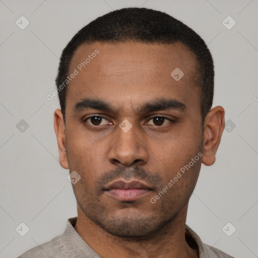 Neutral latino young-adult male with short  black hair and brown eyes