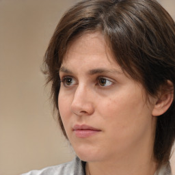 Neutral white adult female with medium  brown hair and brown eyes