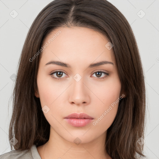 Neutral white young-adult female with long  brown hair and brown eyes