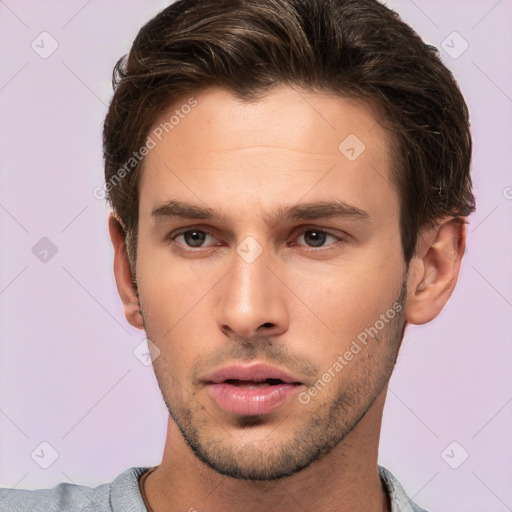 Neutral white young-adult male with short  brown hair and brown eyes