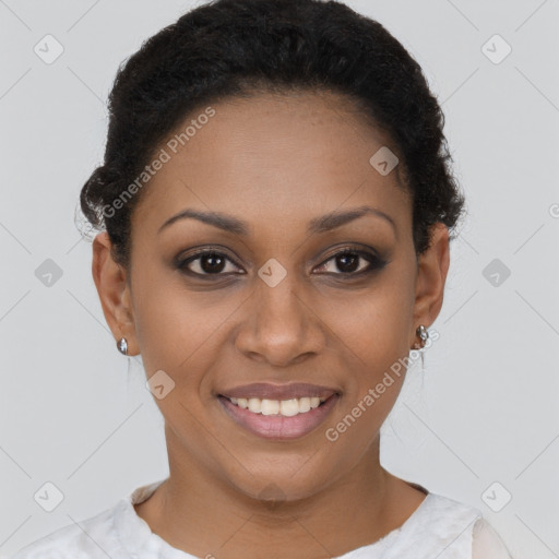 Joyful black young-adult female with short  brown hair and brown eyes