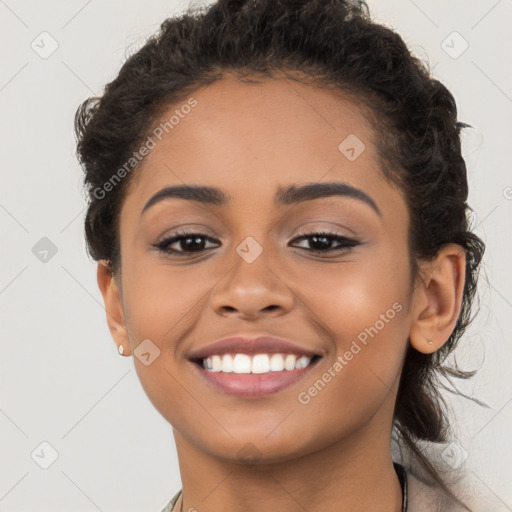 Joyful latino young-adult female with long  brown hair and brown eyes