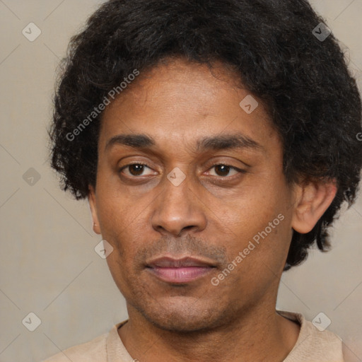 Neutral latino adult male with short  brown hair and brown eyes