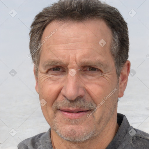 Joyful white middle-aged male with short  brown hair and brown eyes