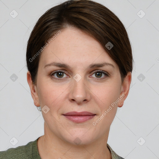 Joyful white young-adult female with short  brown hair and grey eyes