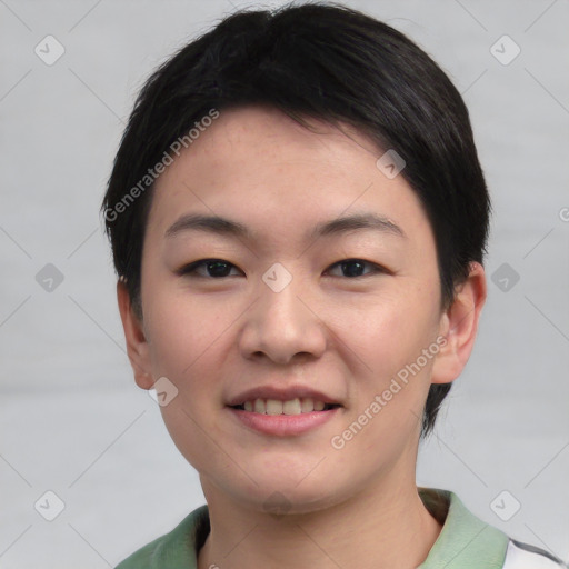 Joyful asian young-adult female with short  black hair and brown eyes