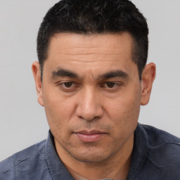 Neutral white adult male with short  black hair and brown eyes