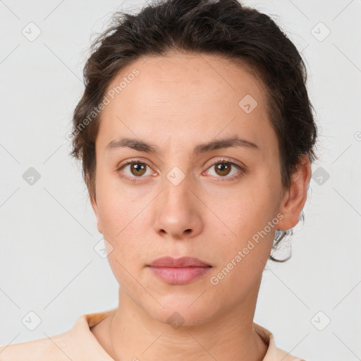 Neutral white young-adult female with short  brown hair and brown eyes