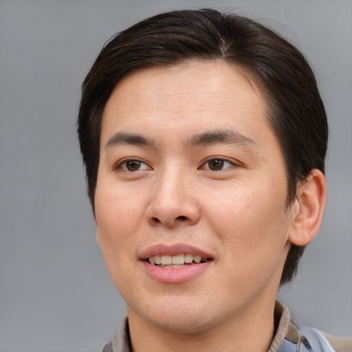 Joyful white young-adult male with medium  brown hair and brown eyes