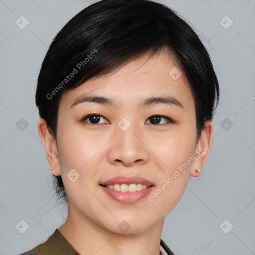 Joyful asian young-adult female with medium  black hair and brown eyes