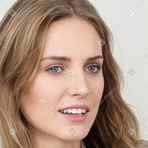 Joyful white young-adult female with long  brown hair and green eyes