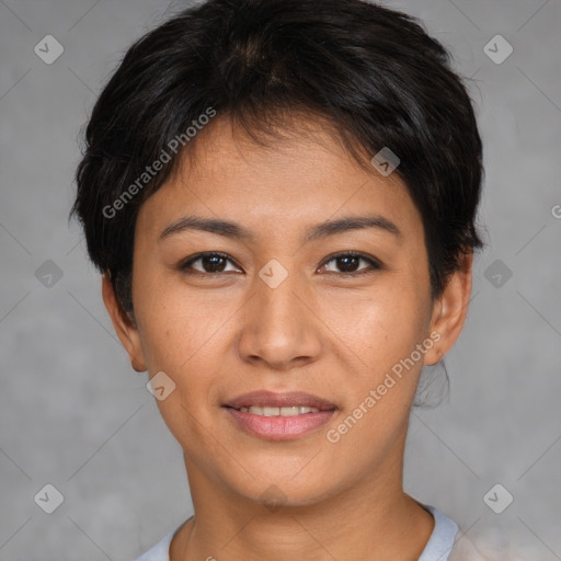 Joyful asian young-adult female with short  brown hair and brown eyes