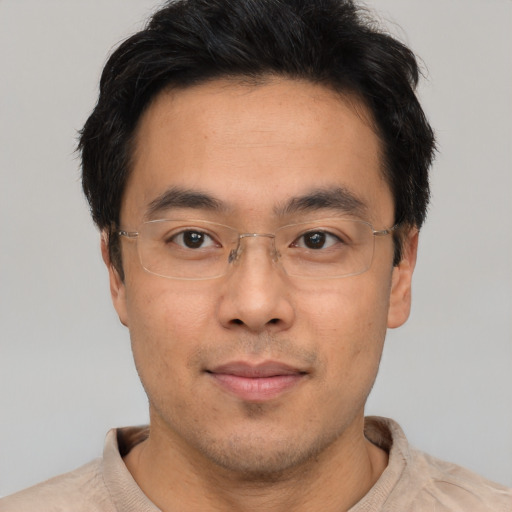 Neutral asian young-adult male with short  black hair and brown eyes