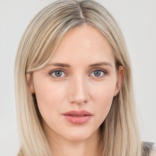 Neutral white young-adult female with long  brown hair and grey eyes