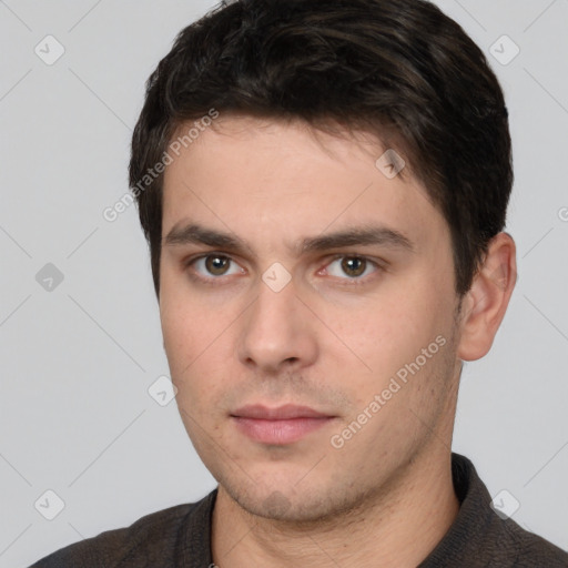 Neutral white young-adult male with short  brown hair and brown eyes