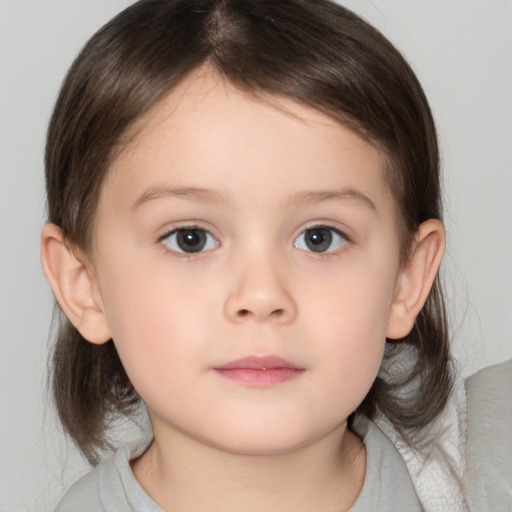 Neutral white child female with medium  brown hair and brown eyes