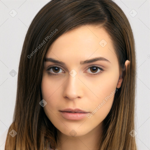 Neutral white young-adult female with long  brown hair and brown eyes