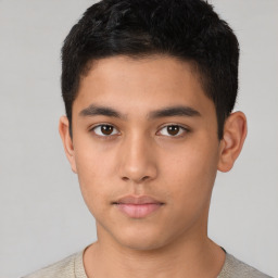 Neutral latino young-adult male with short  brown hair and brown eyes