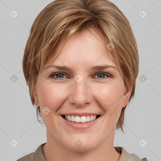 Joyful white young-adult female with medium  brown hair and grey eyes