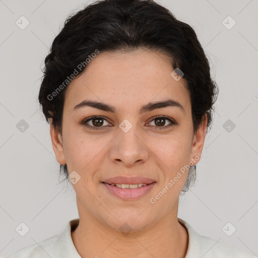 Joyful latino young-adult female with short  brown hair and brown eyes