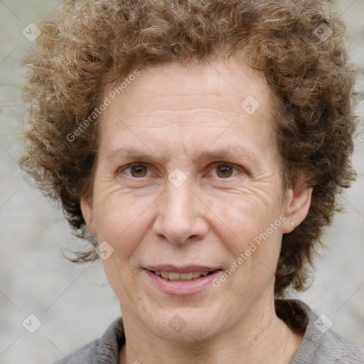 Joyful white adult male with medium  brown hair and brown eyes