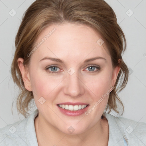 Joyful white young-adult female with medium  brown hair and blue eyes