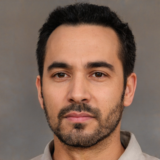 Neutral white young-adult male with short  black hair and brown eyes