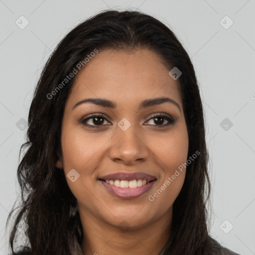 Joyful latino young-adult female with long  brown hair and brown eyes