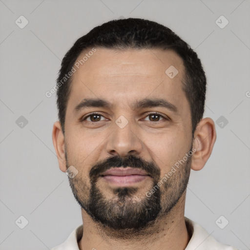 Neutral latino adult male with short  black hair and brown eyes