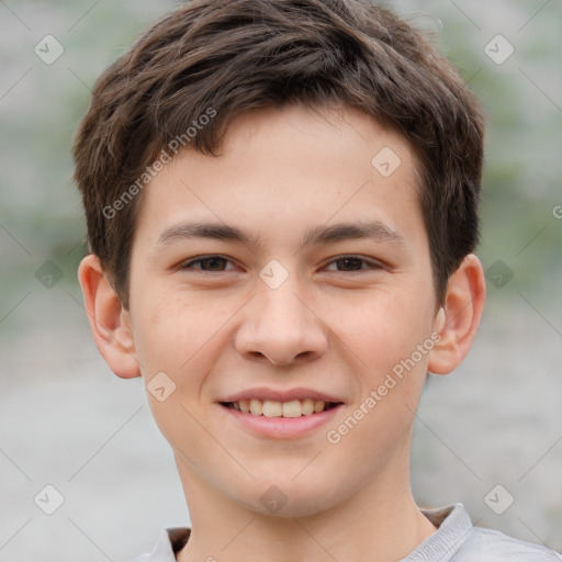 Joyful white child male with short  brown hair and brown eyes