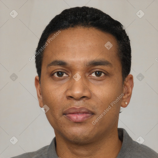 Neutral black adult male with short  black hair and brown eyes