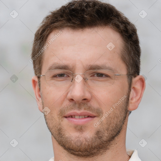 Joyful white adult male with short  brown hair and brown eyes