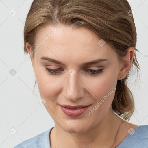 Joyful white young-adult female with medium  brown hair and blue eyes