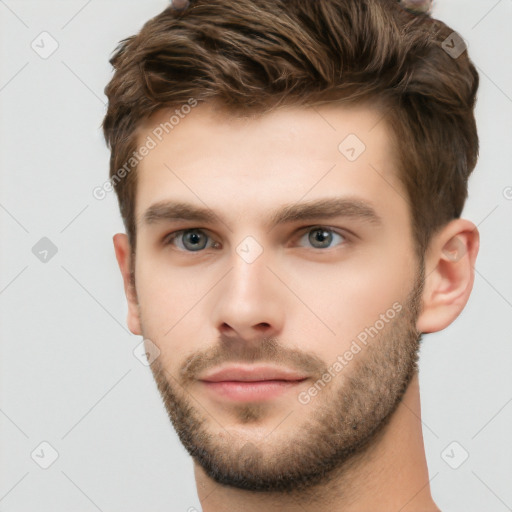 Neutral white young-adult male with short  brown hair and brown eyes