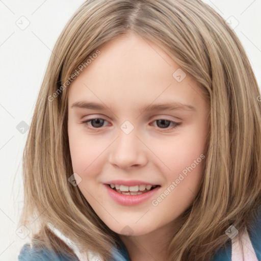 Joyful white child female with medium  brown hair and brown eyes