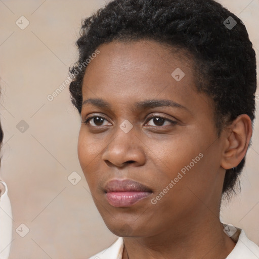 Neutral black young-adult female with short  black hair and brown eyes