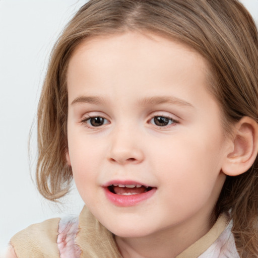 Joyful white child female with medium  brown hair and brown eyes