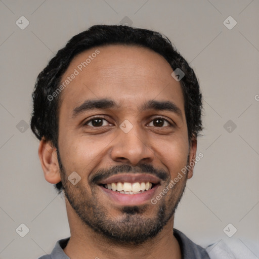 Joyful latino young-adult male with short  black hair and brown eyes