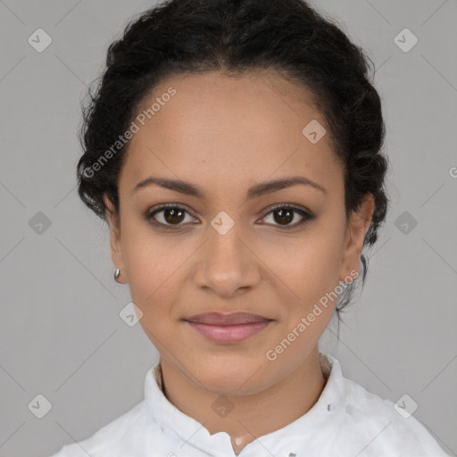 Joyful latino young-adult female with short  brown hair and brown eyes