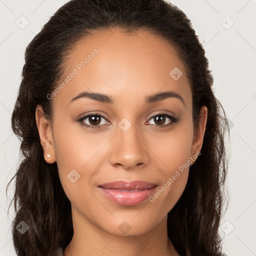 Joyful latino young-adult female with long  brown hair and brown eyes