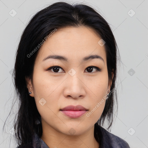 Joyful asian young-adult female with medium  black hair and brown eyes